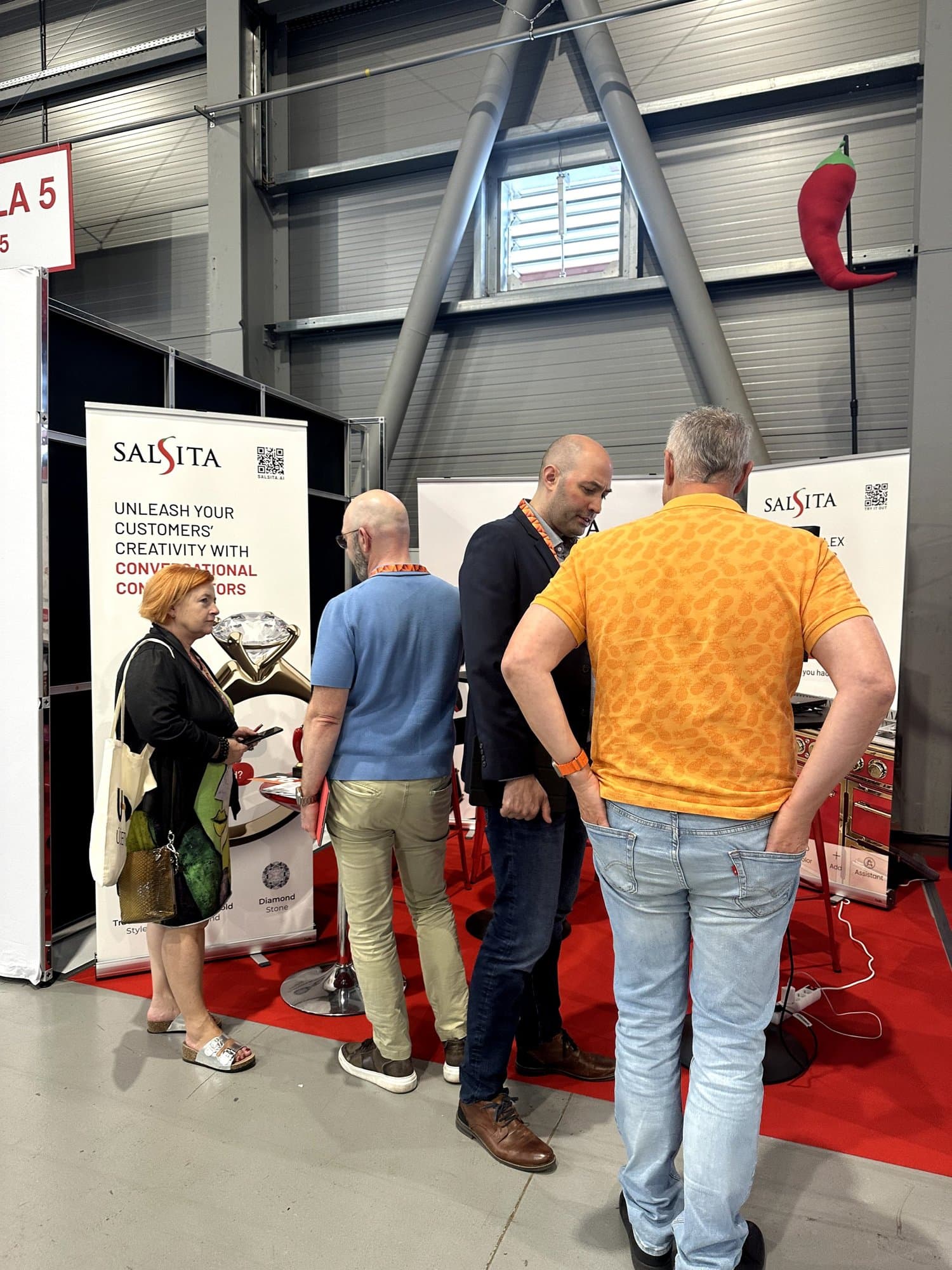 Reshoper 2024 – attendees exploring Salsita demos